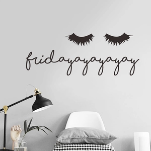 Detail of eyelash wall sticker with modern fridayayayayayay text in a Nordic style room