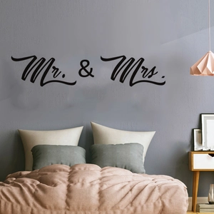 Elegant Mr. & Mrs. vinyl wall decal in black cursive for bedroom home decor accents