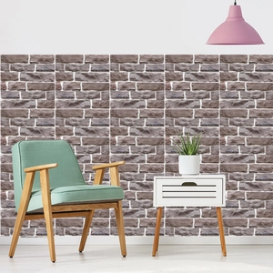 Detail of grey 3D brick pattern wall sticker with textured finish in modern living room