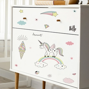Cute hand-drawn rainbow unicorn wall stickers for kids bedroom decor on white furniture
