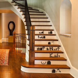 Cartoon mouse family wall decals featuring silhouette mice skating on wooden stairs