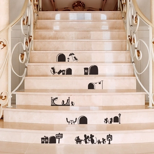 Detailed macro view of cartoon mouse family wall decals on indoor marble stairs