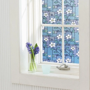 Frosted window film with white flower patterns and blue-purple geometric mosaic design