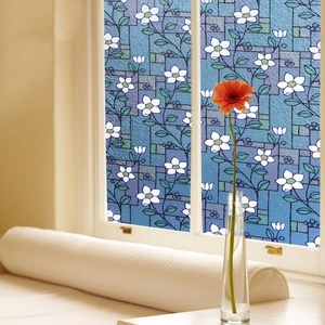 Frosted static window film with blue floral pattern and white petals for home privacy