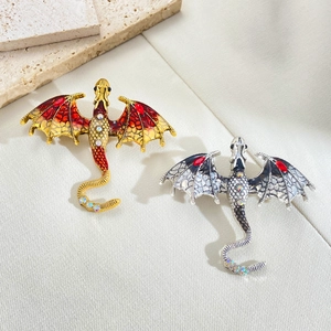 Vintage dragon brooches with enamel wings and rhinestones for suits and coats