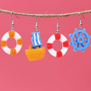 Cute nautical style hook earrings set featuring lifebuoy, sailboat and rudder designs