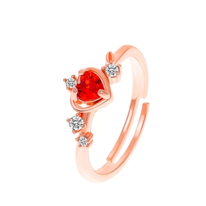 Eleganter roségoldener offener Ring mit rotem Herz-Kristall und kleinen weißen Steinen