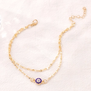 Zweilagiges goldenes Fußkettchen mit blauem Straß-Evil-Eye-Anhänger für Damen
