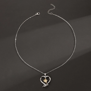 Silver graduation necklace with gold heart pendant and she believed she could engraving
