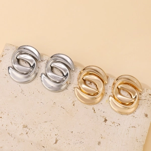 Chic oversized geometric spiral earrings set in gold and silver finishes for women