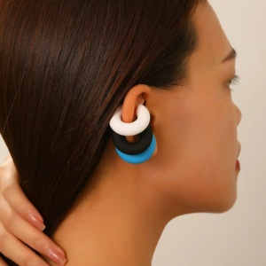 Three-piece set of oval hollow matte ear clips in white, black, and sky blue colors