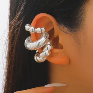 Three-piece set of polished silver non-pierced ear clips with minimalist textured designs