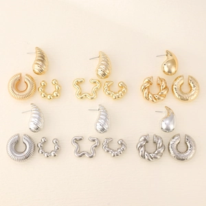Detail of 12-piece gold and silver earring set with geometric hollow hoops and ear cuffs