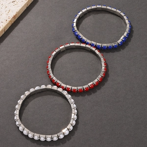 Three-piece stretch bracelet set in red, white, and blue with glossy acrylic bead details