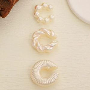 Three-piece set of cream white pearlescent threaded and twisted non-pierced ear cuffs