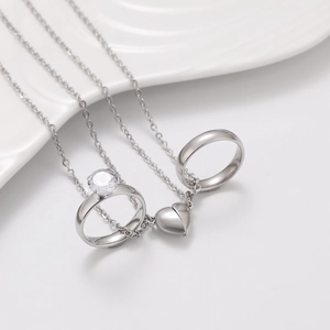 Magnetic couples necklace set with ring pendants and heart magnet in polished silver finish