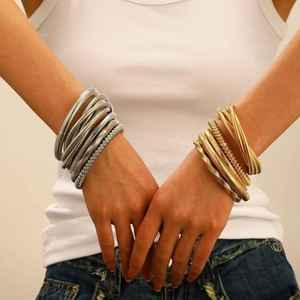 Multilayer elastic snake coil bracelet set in gold and silver metallic finish for women