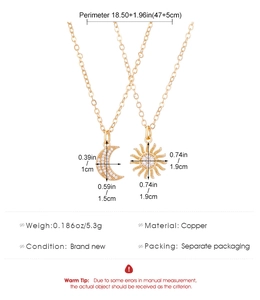 Detail van koperen zon en maan hanger ketting met ingelegde micro-zirkonia