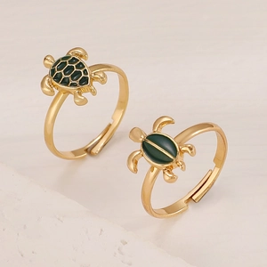 Set di anelli dorati a forma di tartaruga marina con smalto verde per donna