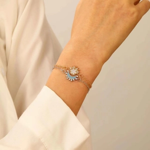 Elegante goudkleurige zon en zilveren maan armbandenset met schitterende zirkonia steentjes