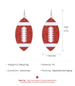 Gros plan de boucles d'oreilles football avec dimensions 6,7 cm x 2,9 cm et poids spécifié