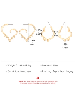 Detailed view of gold irregular lava heart and C-shaped alloy earrings with size specs