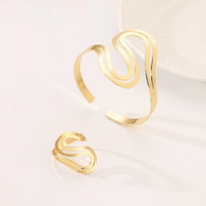 Minimalist gold S-shaped layered open bangle and ring set with elegant wavy lines