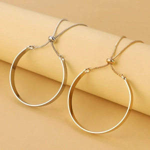 Minimalist adjustable gold and silver slider bracelets with sleek flat metal band design