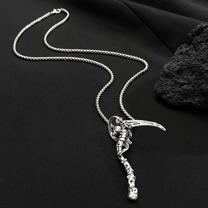Gothic reaper scythe skull necklace with vintage alloy pendant and box chain on black rock