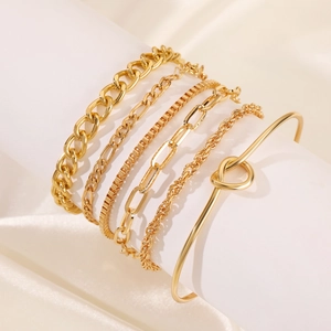Golden 6-piece bracelet set with Cuban, Figaro, paperclip chains and knot cuff bangle