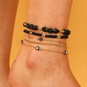Bracelet de cheville multicouche bohème avec pierres noires et breloques œil maléfique