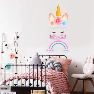 Detail of cartoon unicorn rainbow wall hanging decoration for children's room