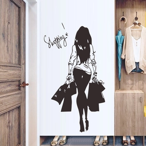 Artistic vinyl wall sticker featuring a silhouette of a girl shopping with stylish lettering