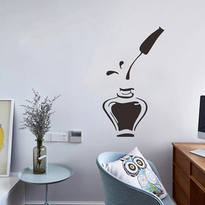 Black silhouette wall decal featuring perfume bottle and dip pen for creative decor
