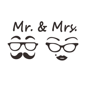 Close-up of Mr. & Mrs. bathroom door stickers with vintage glasses and beard silhouettes