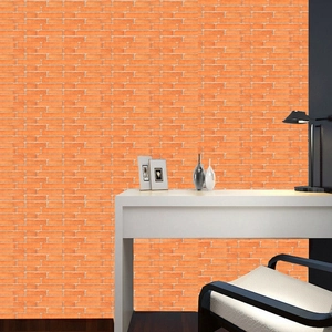 Detail of industrial orange brick wallpaper in a modern home office setting