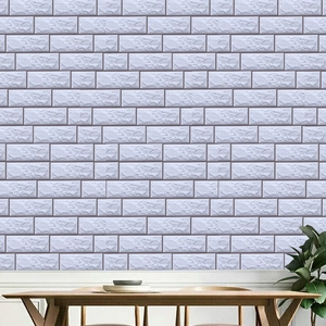 Detail showing the 3D brick texture and seamless patterns of self-adhesive wall tiles