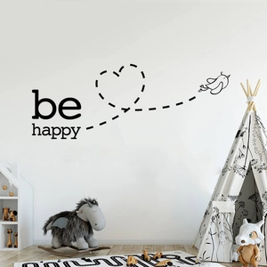 Be Happy flying bird wall sticker with heart trail in a modern minimalist nursery room