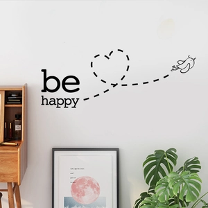 Minimalist 'Be Happy' flying bird wall decal with heart path for home wall decor