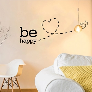 Modern Be Happy wall sticker with flying bird and heart trail in a cozy living room decor