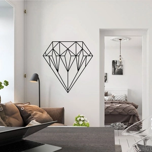 Minimalist black geometric diamond wall sticker in a modern living room setting