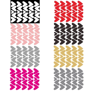 Detail showing eight sets of heart-shaped wall stickers in various colors and sizes