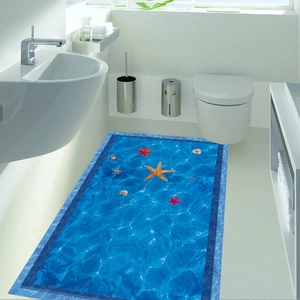 Detail of waterproof sea star and shell themed bathroom floor sticker with blue ocean texture