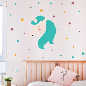 Detail of cartoon unicorn wall decal with colorful stars for kids bedroom decoration
