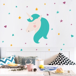 Detail of cartoon unicorn wall sticker with colorful stars for nursery room decor