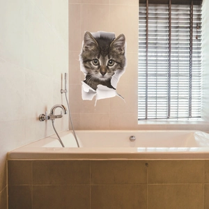 3D realistic brown tabby cat wall sticker appearing through a broken wall in bathroom