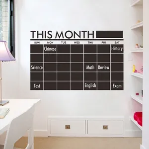 Monthly calendar wall sticker with 35 black squares and This Month title for office organization
