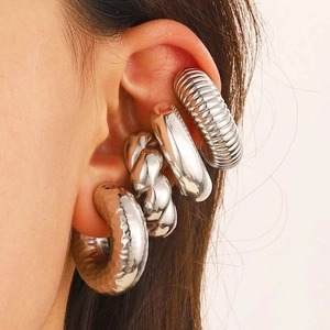 Polished silver ear cuff set with textured screw, smooth, rope and hammered patterns