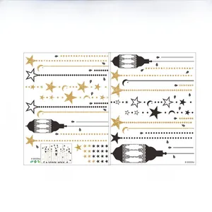 Detail showing two sheets of black and gold Ramadan wall stickers with lanterns and stars