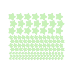 Macro detail of various sizes of glowing star wall stickers on white carrier sheet